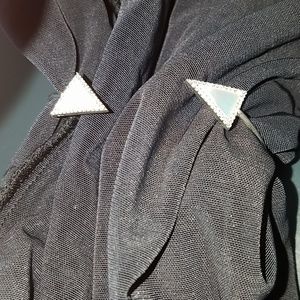 Delicate mother of pearl bangle trimmed in shiny